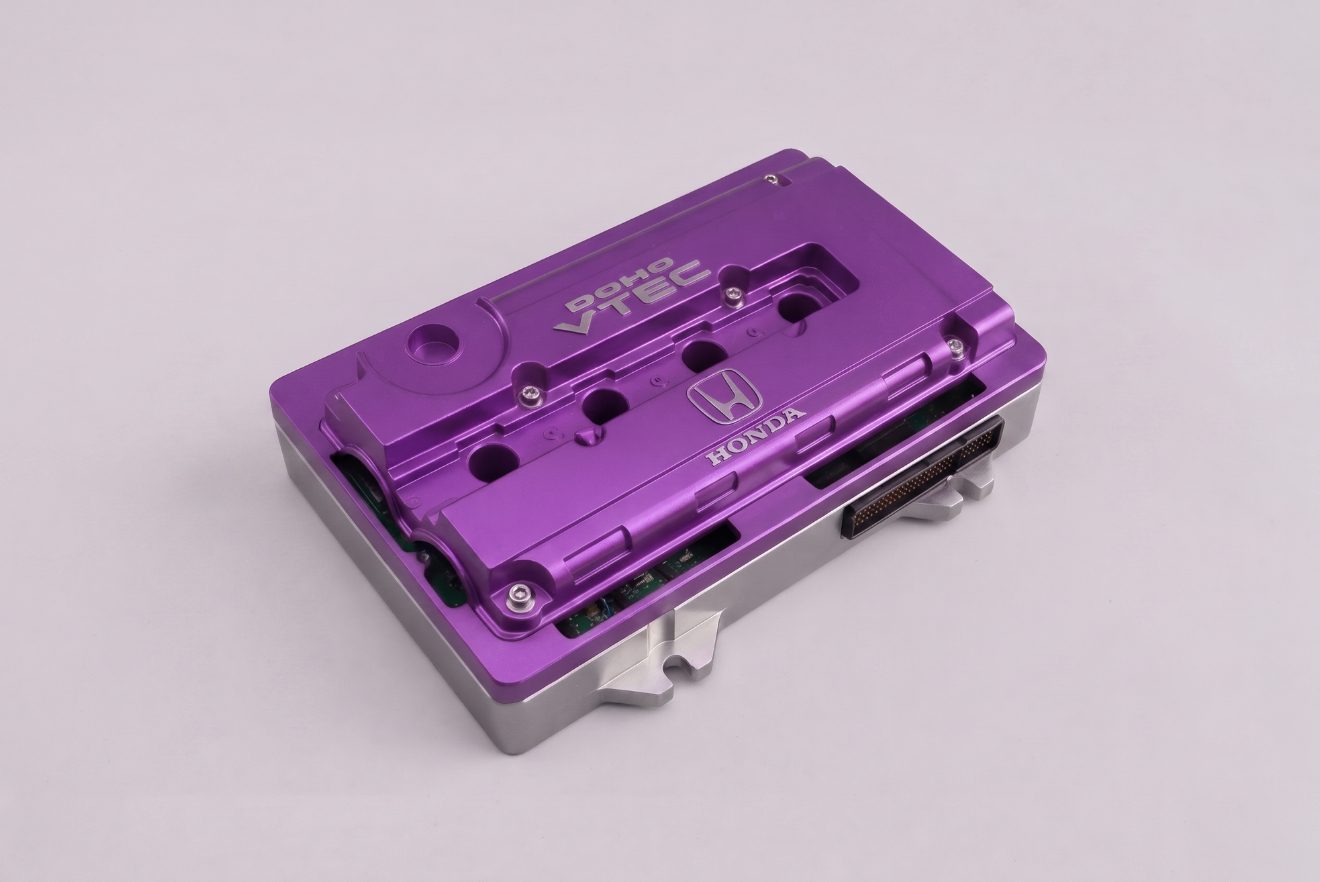 Valve Cover Edition — CNC-machined candy purple OBD-1 ECU cover