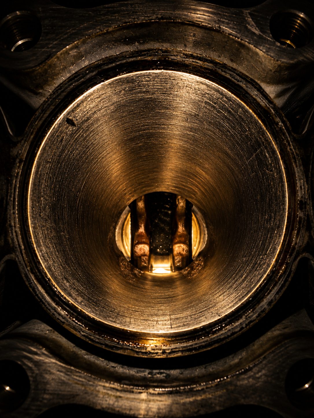 Looking down a freshly honed cylinder at the crank below